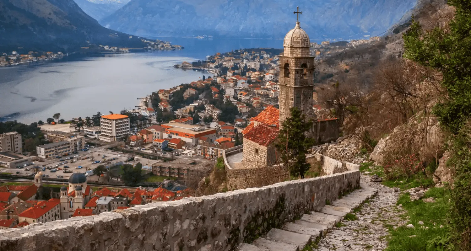 View of Kotor Bay and historic church from the hilltop in Montenegro.